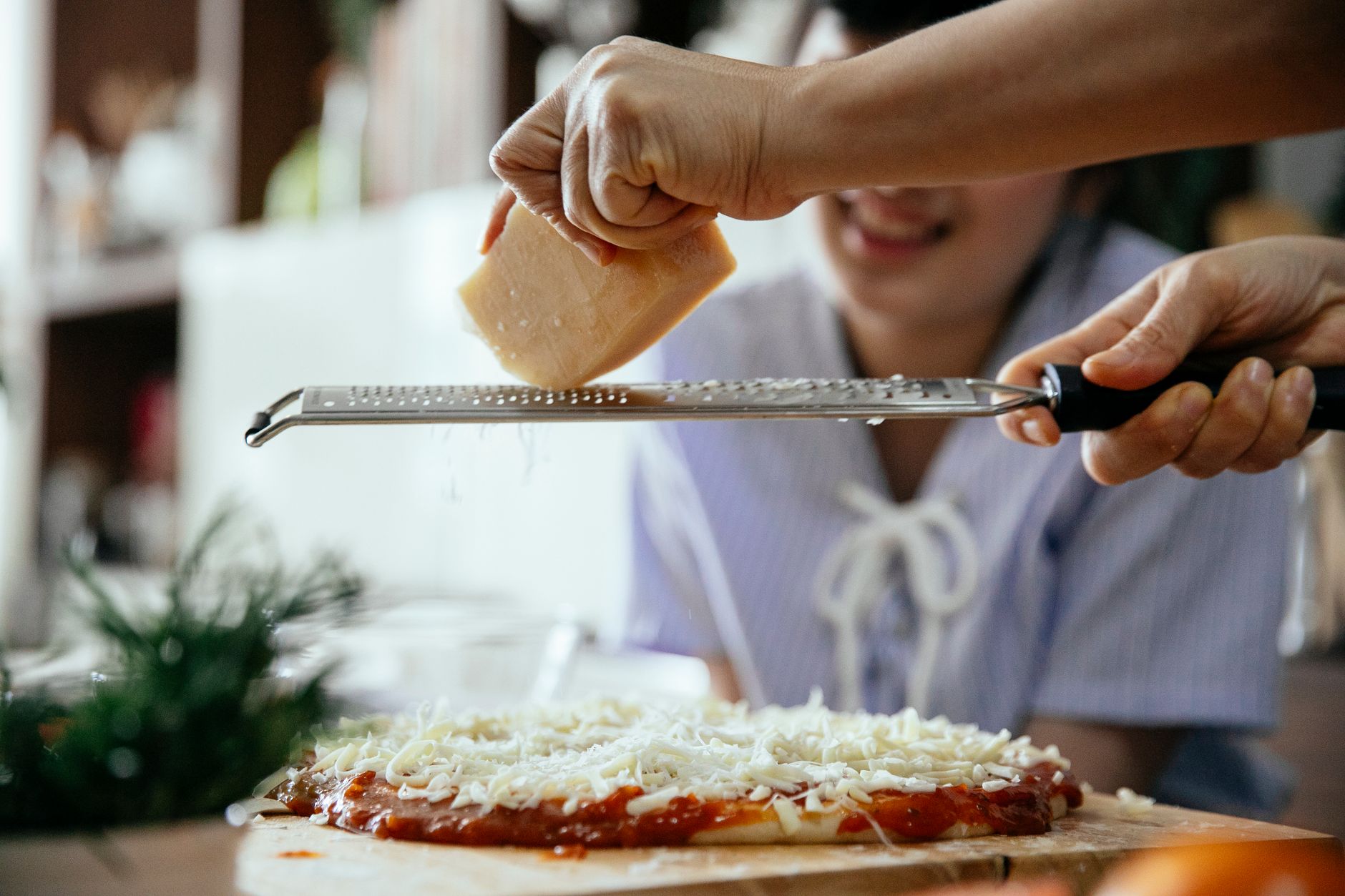 Grating fresh horseradish root