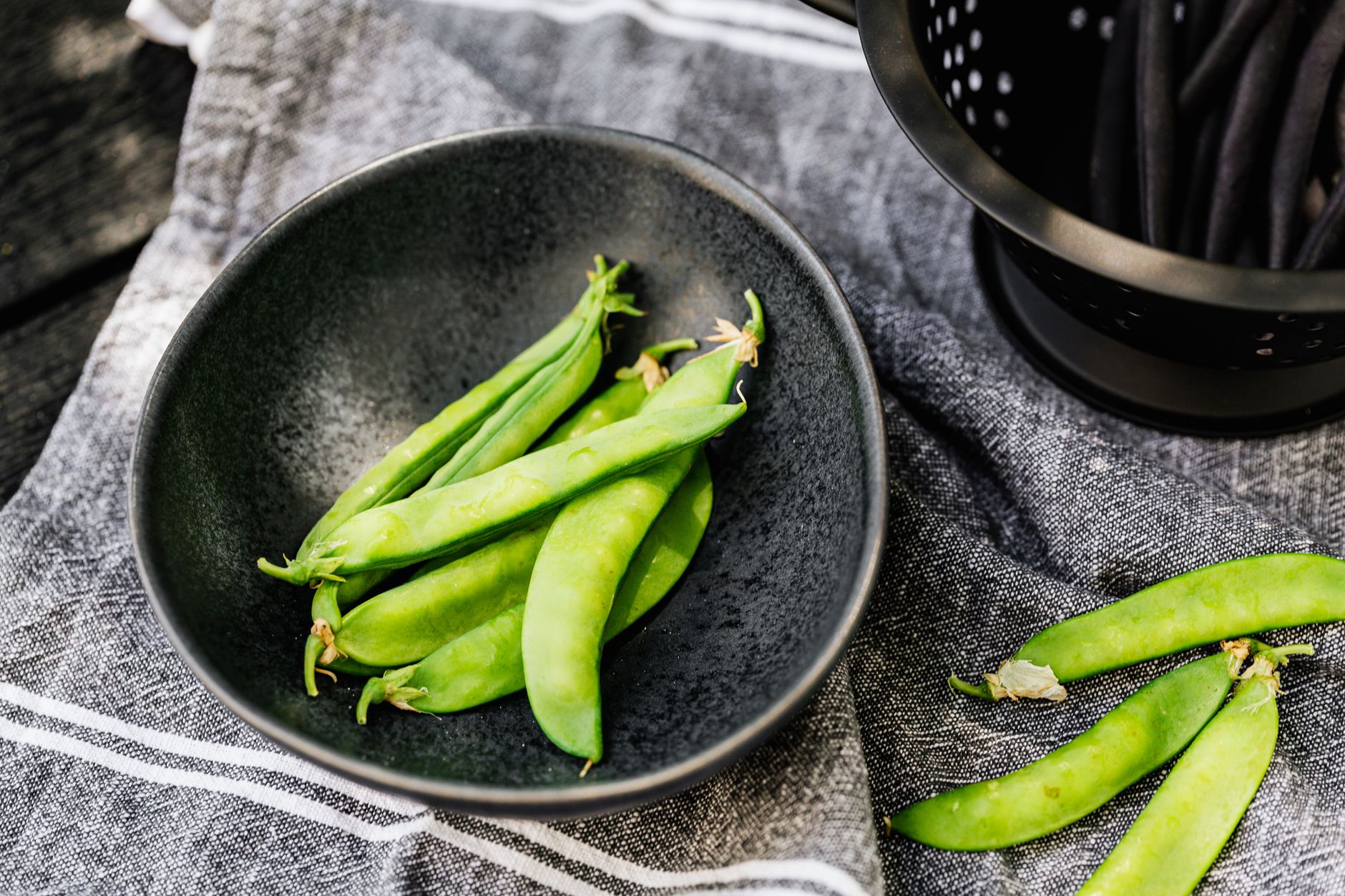 Fresh pea harvest in a basket